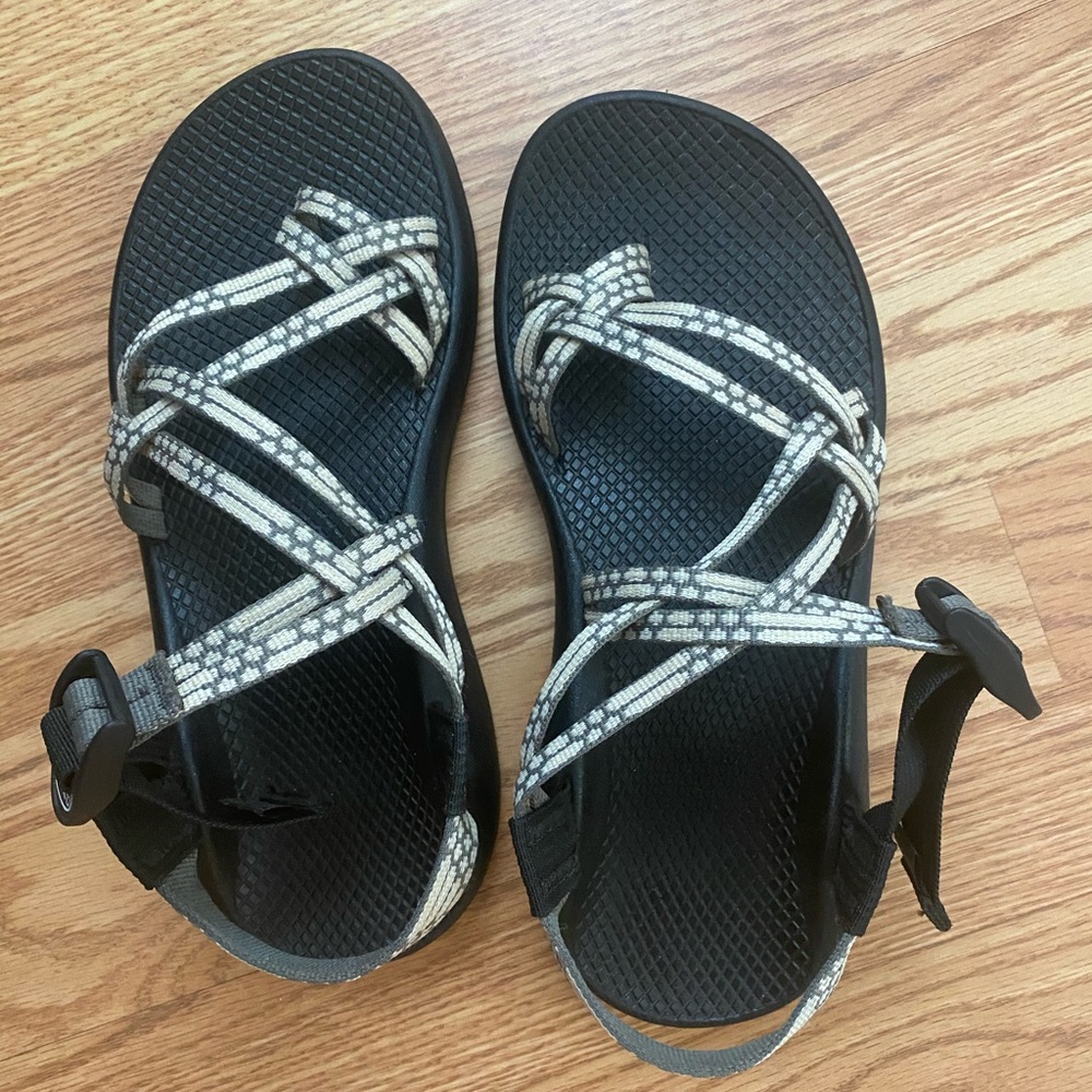 Grey and white double strap chacos